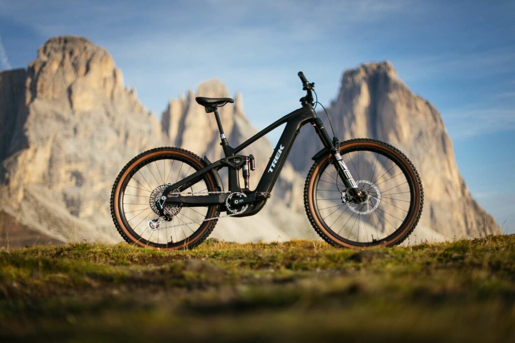 A trek rail+ in centre of image, in front of the dolomites