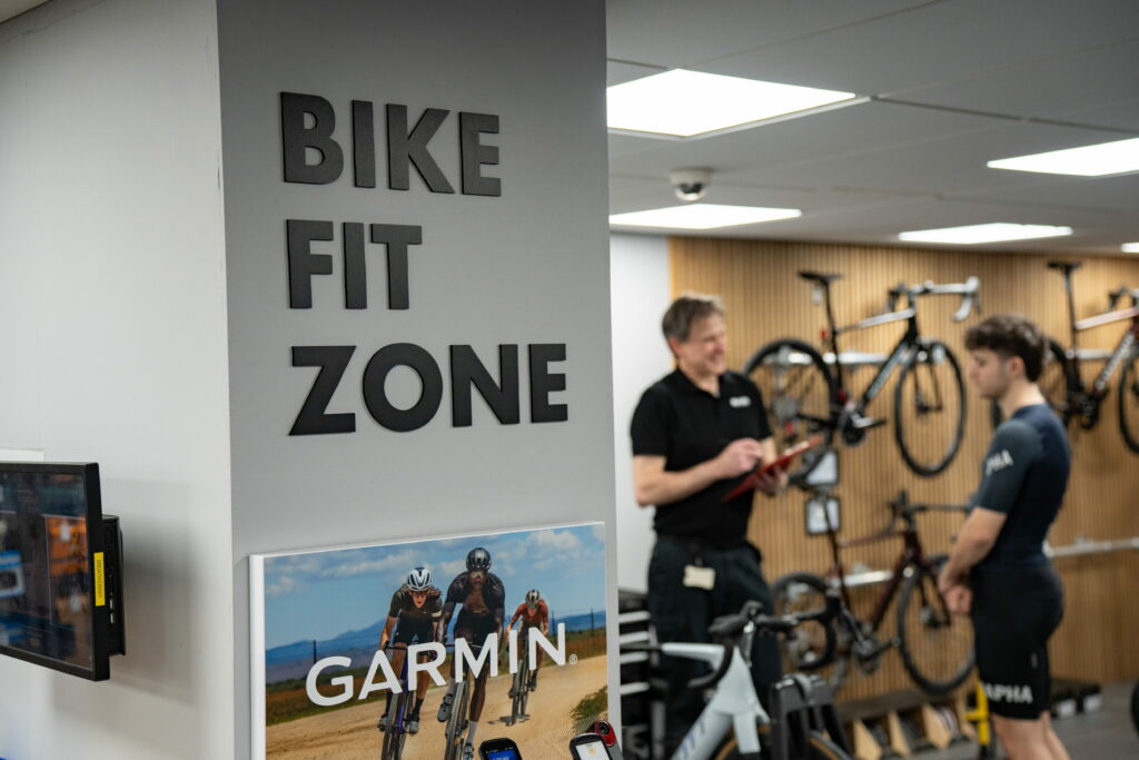 A rider being measured in the Bike Fit Zone at Balfe's Bikes Gatwick