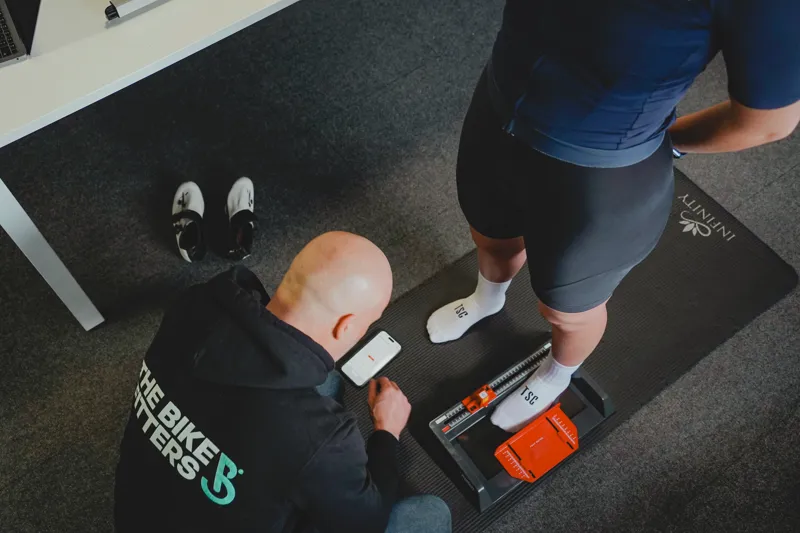 Rider position being assessed during a mobile bike fit