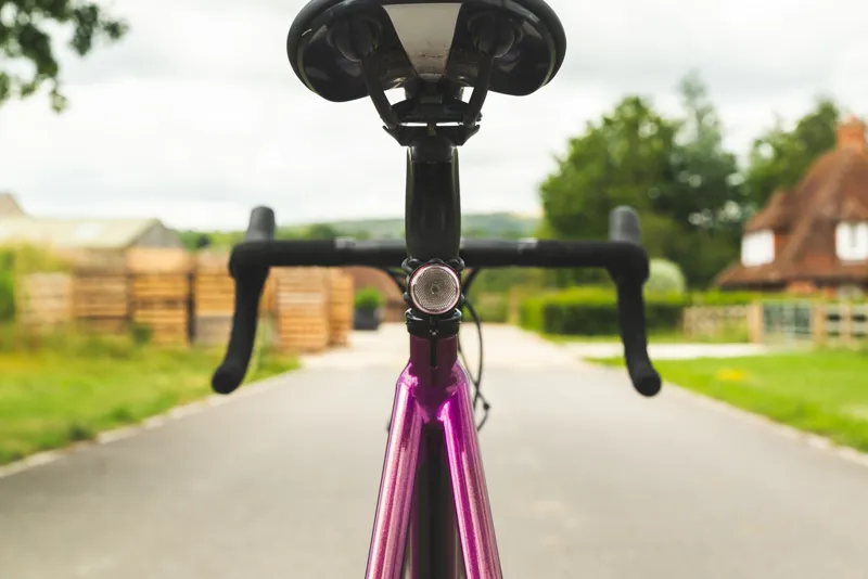 USE TraceR - USB-C Rechargeable Rear light - with DayBright ReAKT and Peloton in Red-1
