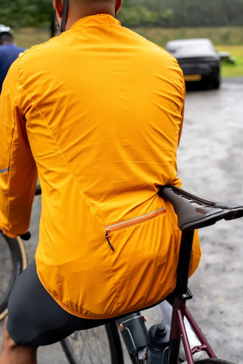 Madison Freewheel Men's Windproof Packable Jacket in Mango Orange-3